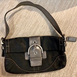 Black and metallic Coach clutch